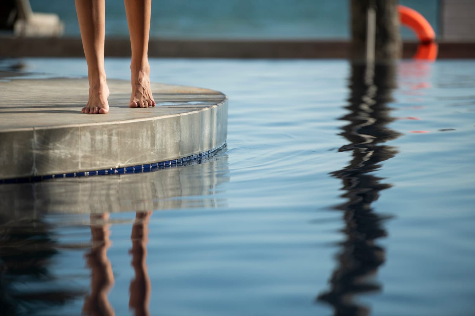 Close view of clear pool water with a gentle ripple after a maintenance visit